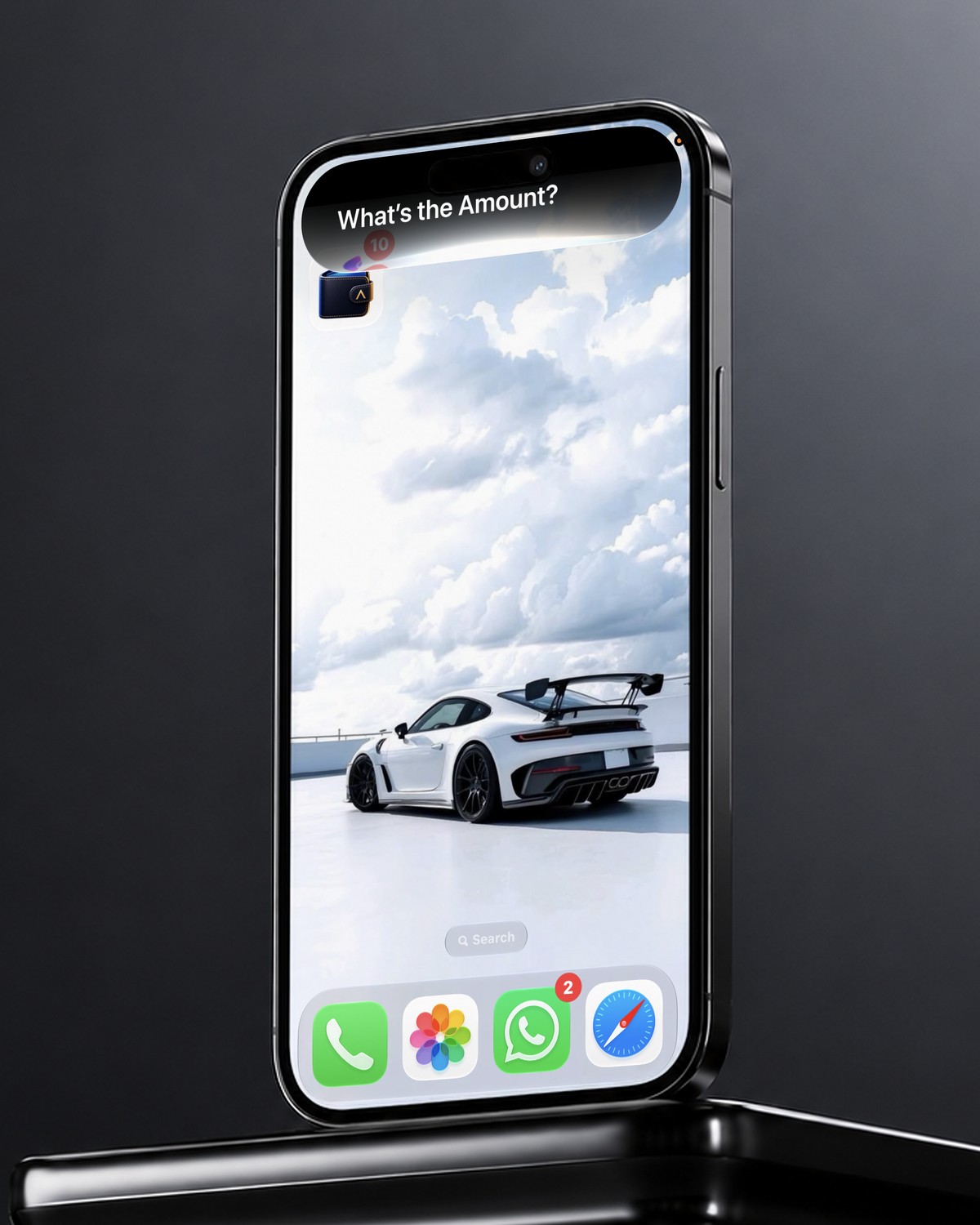 Siri asking 'What's the amount?' on an iPhone, to log an expense in AIVA